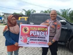 Bhabinkamtibmas Polsek Baamang  Sosialisasi Saber Pungli Terhadap warga masyarakat Kec. Baamang.