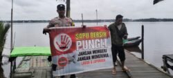 Personel Polsek Pulau Hanaut, Laksanakan Sosialisasi Saber Pungli terhadap masyarakat Kec. Pulau Hanaut