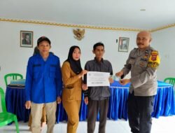 Bhabinkamtibmas Dampingi Penyaluran Dana BLT-DD Desa Muara Bumban