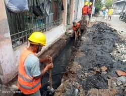 Proyek sarana prasarana Di Jalan Grudo II RW 01 Kelurahan Dr.Soetomo Kecamatan Tegalsari Sesuai SOP Dan Standar Teknis