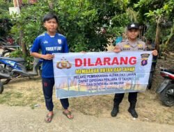 Personel Polsek Dusun Hilir Sampaikan Larangan Karhutla Dengan Warga Masyarakat