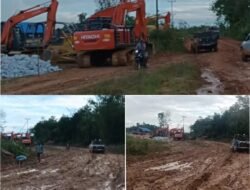 IRONIS! Alat Berat Nganggur di Depan Pondok Bupati, Jalan Manding Rusak Parah