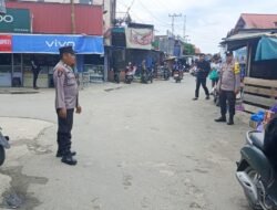 Personil polsek lakukan Patroli ke pasar harian Pujon desa Pujon.