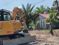 Alat Berat Dikerahkan, Percepat Pembangunan Rabat Beton Sasaran TMMD Reguler Ke-129