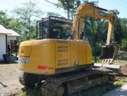 Percepatan Pembangunan, Satgas TMMD Reguler ke-129 Ratakan Sasaran Rabat Beton Gunakan Alat Berat