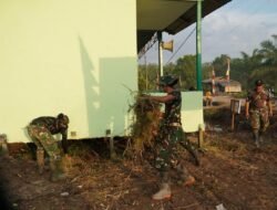 Satgas TMMD Ke-129 Bersihkan Halaman Poskamling Demi Menjaga Kerapian