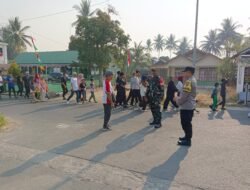 Babinsa Koramil Pandawan Amankan Jalan Santai Semarak HUT ke-81 RI