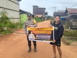 POLSEK MARIKIT SOSIALISASIKAN LARANGAN KARHUTLA DAN SANKSI HUKUM KEPADA WARGA DESA TUMBANG DAKEI