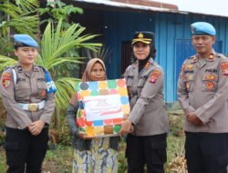 Propam Polres Gunung Mas Salurkan Air Bersih dan Sembako bagi Warga Terdampak Kemarau