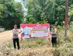 *Bhabinkamtibmas Pasang Spanduk Larangan Karhutla di Desa Binaan, Polsek Benua Lima Perkuat Edukasi Warga**